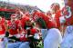 NEW BRUNSWICK, NJ - NOVEMBER 19: Eric LeGrand #52 of the Rutgers Scarlet Knights posses for a photo with teammates on Senior's Day at center field before a game against Cincinnati Bearcats at Rutgers Stadium on November 19, 2011 in New Brunswick, New Jer