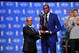 OKLAHOMA CITY, OK - MAY 6: Percy Vaughn of Kia presents Kevin Durant of the Oklahoma City Thunder with the Maurice Podoloff Trophy as the 2013-14 Kia Most Valuable Player of the Year at the Thunder Events Center on May 6, 2014 in Oklahoma City, Oklahoma.