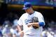 LOS ANGELES, CA - APRIL 04: Hyun-Jin Ryu #99 of the Los Angeles Dodgers reacts after a second run in the inning to the San Francisco Giants to trail 8-0 during the second inning on opening day at Dodger Stadium on April 4, 2014 in Los Angeles, California