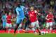 LONDON, ENGLAND - MARCH 29: Yaya Toure of Manchester City clashes with Tomas Rosicky of Arsenal during the Barclays Premier League match between Arsenal and Manchester City at Emirates Stadium on March 29, 2014 in London, England. (Photo by Shaun Botte