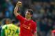 NORWICH, ENGLAND - APRIL 20: Jon Flanagan of Liverpool celebrates victory at the final whistle during the Barclays Premier League match between Norwich City and Liverpool at Carrow Road on April 20, 2014 in Norwich, England. (Photo by Jamie McDonald/Get