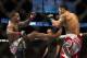 Jan 15, 2014; Duluth, GA, USA; Lorenz Larkin (red gloves) fights Brad Tavares (blue gloves) during UFC Fight Night at Gwinnett Center. Mandatory Credit: Joshua S. Kelly-USA TODAY Sports
