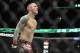 Jan 25, 2014; Chicago, IL, USA; Eddie Wineland reacts after beating Yves Jabouin (not pictured) during UFC on FOX 10 at the United Center. Mandatory Credit: David Banks-USA TODAY Sports