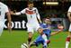 MILAN, ITALY - NOVEMBER 15: Thiago Motta of Italy and Mesut Ozil of Germany #8 compete for the ball during the international friendly match between Italy and Germany at Giuseppe Meazza stadium on November 15, 2013 in Milan, Italy. (Photo by Claudio Vill