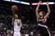 May 6, 2014; San Antonio, TX, USA; San Antonio Spurs guard Tony Parker (9) drives to the basket under pressure from Portland Trail Blazers center Robin Lopez (42) in game one of the second round of the 2014 NBA Playoffs at AT&T Center. Mandatory Credit: S