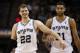 May 8, 2014; San Antonio, TX, USA; San Antonio Spurs forward Tiago Splitter (22) and forward Tim Duncan (21) walk onto the court after a timeout against the Portland Trail Blazers in game two of the second round of the 2014 NBA Playoffs at AT&T Center. Ma