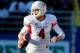 SAN JOSE, CA - NOVEMBER 29: Quarterback Derek Carr #4 of the Fresno State Bulldogs scrambles a bit before throwing a Hail Mary pass to end the second quarter against the San Jose State Spartans on November 29, 2013 at Spartan Stadium in San Jose, Califor