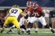 Sep 1, 2012; Arlington, TX, USA; Alabama Crimson Tide left tackle Cyrus Kouandjio (71) on the line of scrimmage during the second quarter against the Michigan Wolverines at Cowboys Stadium. Alabama beat Michigan 41-14. Mandatory Credit: Tim Heitman-USA TO