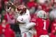Nov 23, 2013; Columbus, OH, USA; Indiana Hoosiers wide receiver Cody Latimer (3) catches the ball as Ohio State Buckeyes cornerback Bradley Roby (1) tries to tackle him in the first quarter of the game at Ohio Stadium. Mandatory Credit: Trevor Ruszkowksi-