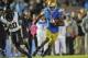 October 12, 2013; Pasadena, CA, USA; UCLA Bruins wide receiver Shaquelle Evans (1) runs the ball to score a touchdown against the California Golden Bears during the second half at the Rose Bowl. Mandatory Credit: Gary A. Vasquez-USA TODAY Sports