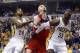 May 7, 2014; Indianapolis, IN, USA; Washington Wizards center Marcin Gortat (4) battles for rebounding position with Indiana Pacers center Roy Hibbert (55) and forward Paul George (24) in game two of the second round of the 2014 NBA Playoffs at Bankers Li