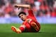 LIVERPOOL, ENGLAND - MAY 11: Luis Suarez of Liverpool reacts during the Barclays Premier League match between Liverpool and Newcastle United at Anfield on May 11, 2014 in Liverpool, England. (Photo by Laurence Griffiths/Getty Images)