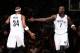 BROOKLYN, NY - MAY 10: Paul Pierce #34 and Kevin Garnett #2 of the Brooklyn Nets slap hands during a game against the Miami Heat during Game Three of the Eastern Conference Semifinals on May 10, 2014 at Barclays Center in Brooklyn. NOTE TO USER: User expr
