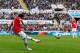 NEWCASTLE-UPON-TYNE, ENGLAND - APRIL 05: Juan Mata of Manchester United scores his sides first goal during the Barclays Premier League match between Newcastle United and Manchester United at St James' Park on April 5, 2014 in Newcastle-Upon-Tyne, England.