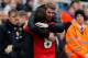 NEWCASTLE UPON TYNE, ENGLAND - APRIL 05: Juan Mata of Manchester United celebrates his first goal with team mate David De Gea (R) during the Barclays Premier League match between Newcastle United and Manchester United at St James' Park on April 5, 2014 in