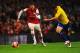 LONDON, ENGLAND - JANUARY 24: Carl Jenkinson of Arsenal chases the ball with Blair Adams of Coventry City during the FA Cup with Budweiser Fourth round match between Arsenal and Coventry City at Emirates Stadium on January 24, 2014 in London, England. (