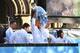 MANCHESTER, ENGLAND - MAY 12: Vincent Kompany of Manchester City lifts the Barclays Premier League trophy aloft outside Manchester Town Hall at the start of the Manchester City victory parade around the streets of Manchester on May 12, 2014 in Manchester