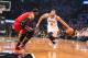 BROOKLYN, NY - MAY 12: Deron Williams #8 of the Brooklyn Nets drives against LeBron James #6 of the Miami Heat in Game Four of the Eastern Conference Semifinals during the 2014 NBA Playoffs on May 12, 2014 at Barclays Center in Brooklyn. NOTE TO USER: Use