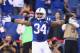 INDIANAPOLIS, IN - DECEMBER 15: Trent Richardson #34 of the Indianapolis Colts celebrates after scoring a touchdown during the NFL game against the Houston Texans at Lucas Oil Stadium on December 15, 2013 in Indianapolis, Indiana. (Photo by Andy Lyons/G