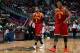 ATLANTA, GA - APRIL 04: Kyrie Irving #2 and Dion Waiters #3 of the Cleveland Cavaliers walk off the court between free throws in their 117-98 loss to the Atlanta Hawks at Philips Arena on April 4, 2014 in Atlanta, Georgia. NOTE TO USER: User expressly a