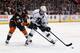 ANAHEIM, CA - JANUARY 23: Anze Kopitar #11 of the Los Angeles Kings is pursued by Ryan Getzlaf #15 of the Anaheim Ducks for the puck in the second period at Honda Center on January 23, 2014 in Anaheim, California. (Photo by Jeff Gross/Getty Images)