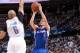 OKLAHOMA CITY, OK - May 13, 2014: J.J. Redick #4 of the Los Angeles Clippers shoots the ball against the Oklahoma City Thunder in Game 5 of the Western Conference Semifinals during the 2014 NBA Playoffs at the Chesapeake Arena on May 13, 2014 in Oklahoma