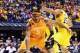 Mar 28, 2014; Indianapolis, IN, USA; Tennessee Volunteers forward Jarnell Stokes (5) drives past Michigan Wolverines forward Jon Horford (15) in the first half in the semifinals of the midwest regional of the 2014 NCAA Mens Basketball Championship tournam