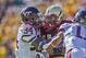 Nov 2, 2013; Boston, MA, USA; Boston College Eagles running back Andre Williams (44) is stopped by Virginia Tech Hokies safety Kyshoen Jarrett (34) in the first quarter at Alumni Stadium. Mandatory Credit: Ed Wolfstein-USA TODAY Sports