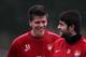 ST ALBANS, ENGLAND - DECEMBER 15: Goalkeepers, Wojciech Szczesny and Lukasz Fabianski have a laugh during the Arsenal Training Session at London Colney on December 15, 2010 in St Albans, England. (Photo by Dean Mouhtaropoulos/Getty Images)