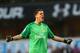 LONDON, ENGLAND - MARCH 16: Wojciech Szczesny of Arsenal celebrates victory at the final whistle during the Barclays Premier League match between Tottenham Hotspur and Arsenal at White Hart Lane on March 16, 2014 in London, England. (Photo by Paul Gilha