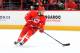 RALEIGH, NC - MARCH 25: John-Michael Liles #26 of the Carolina Hurricanes carries the puck during their NHL game against the New York Islanders at PNC Arena on March 25, 2014 in Raleigh, North Carolina. (Photo by Gregg Forwerck/NHLI via Getty Images)