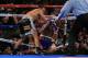 BROOMFIELD, CO - OCTOBER 19: Ruslan Provodnikov (L) of Russia knocks down Mike Alvarado (R) on the ropes in the eighth round at the 1stBank Center on October 19, 2013 in Broomfield, Colorado. Provodnikov won the bout and claimed the WBO Junior Welterweig