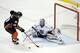 May 16, 2014; Anaheim, CA, USA; Los Angeles Kings goalie Jonathan Quick (32) poke checks the puck off the stick of Anaheim Ducks right wing Corey Perry (10) on a penalty shot during the first period in game seven of the second round of the 2014 Stanley Cu