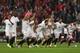 TURIN, ITALY - MAY 14: Players of Sevilla FC celebrate victory in the penalty shoot out during the UEFA Europa League Final between Sevilla FC and SL Benfica at Juventus Arena on May 14, 2014 in Turin, Italy. (Photo by Michael Steele/Getty Images)
