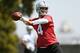 ALAMEDA, CA - MAY 16: Derek Carr #4 of the Oakland Raiders participates in drills during Rookie Minicamp on May 16, 2014 in Alameda, California. (Photo by Thearon W. Henderson/Getty Images)