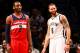 Mar. 8, 2013; Brooklyn, NY, USA; Brooklyn Nets point guard Deron Williams (8) and Washington Wizards point guard John Wall (2) share a laugh on the court during the second half at Barclays Center. Nets won 95-78. Mandatory Credit: Debby Wong-USA TODAY Spo