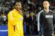 LONDON, ENGLAND - OCTOBER 4: Kobe Bryant #24 of the Los Angeles Lakers and Kevin Love #42 of the Minnesota Timberwolves talk to the crowd at The O2 arena on October 4, 2010 in London, England. NOTE TO USER: User expressly acknowledges and agrees that, b