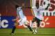 EAST RUTHERFORD, NJ - JUNE 08: Freddy Adu #19 of the United States of America drives the ball past Javier Zanetti #8 of Argentina during their match at Giants Stadium on June 8, 2008 in East Rutherford, New Jersey. (Photo by Al Bello/Getty Images)