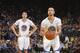 OAKLAND, CA - MARCH 22: Klay Thompson #11 of the Golden State Warriors watches teammate Stephen Curry #30 shoot a attempts a free throw shot against the San Antonio Spurs on March 22, 2014 at Oracle Arena in Oakland, California. NOTE TO USER: User express