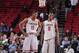 PORTLAND, OR - APRIL 20: Joel Embiid #11 and Andrew Wiggins #8 of the World Select Team smile during the game against the USA Junior Select Team at the 2013 Nike Hoop Summit game on April 20, 2013 at the Rose Garden Arena in Portland, Oregon. NOTE TO USE