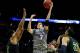 SAN ANTONIO, TX - MARCH 23: Doug McDermott #3 of the Creighton Bluejays takes a shot as Rico Gathers #2 and Isaiah Austin #21 of the Baylor Bears defend during the third round of the 2014 NCAA Men's Basketball Tournament at the AT&T Center on March 23, 2