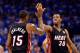 OKLAHOMA CITY, OK - JUNE 14: Mario Chalmers #15 and Norris Cole #30 of the Miami Heat celebrate a play in the first half while taking on the Oklahoma City Thunder in Game Two of the 2012 NBA Finals at Chesapeake Energy Arena on June 14, 2012 in Oklahoma