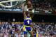 BOSTON - 1987: Byron Scott #4 of the Los Angeles Lakers rebounds against the Boston Celtics during the 1987 NBA Finals at the Boston Garden in Boston, Massachusetts. The Los Angeles Lakers defeated the Boston Celtics 4-2 to win the NBA Championship. NOTE