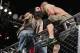 Luke Harper interferes in John Cena's cage match with Bray Wyatt.