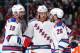 MONTREAL, QC - MAY 19: Martin St. Louis #26 of the New York Rangers talks with Carl Hagelin #62 and Brad Richards #19 against the Montreal Canadiens during the third period in Game Two of the Eastern Conference Final during the 2014 Stanley Cup Playoffs