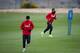 SEGOVIA, SPAIN - MAY 22: Diego Costa (L) of Atletico de Madrid excersises with his teammate Arda Turan (R) during a training session prior to UEFA Champions League Final between Club Atletico de Madrid and Real Madrid CF on May 22, 2014 at Los Angeles de