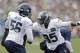 Mayowa could back up Cliff Avril or start opposite him.