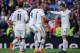 MADRID, SPAIN - NOVEMBER 09: Karim Benzema (2ndR) celebrates scoring their second goal with teammates Luka Modric (3dR), Cristiano Ronaldo (R), Gareth Bale (2ndL) and Alvaro Arbeloa (L) during the La Liga match between Real Madrid CF and Real Sociedad de