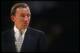 1990-1991: Los Angeles Lakers head coach Mike Dunleavy looks on during a game against the San Antonio Spurs at the Alamodome in San Antonio, Texas. Mandatory Credit: Mike Powell /Allsport Mandatory Credit: Mike Powell /Allsport