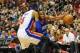 Mar 29, 2014; Philadelphia, PA, USA; Philadelphia 76ers forward Thaddeus Young (21) drives to the net as Detroit Pistons forward Josh Smith (6) defends during the 3rd quarter of the game at Wells Fargo Center. The Philadelphia 76ers broke a 26 game losin